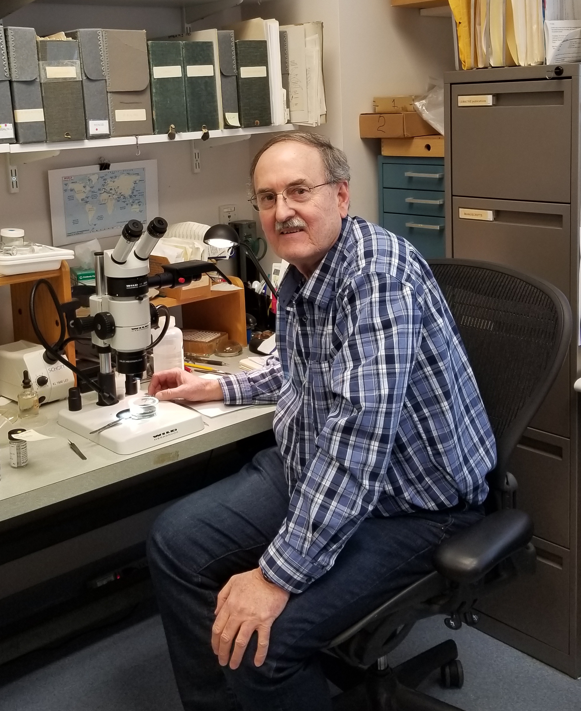 Rafael Lemaitre with microscope