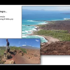 Video frame showing a photo of Galapagos coastline and scientists doing field work on a hill overlooking the coast. 