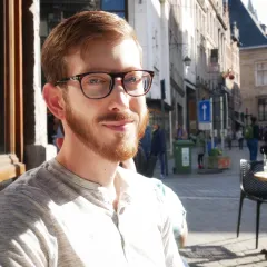 Image of Mike enjoying a morning crepe in Brussels