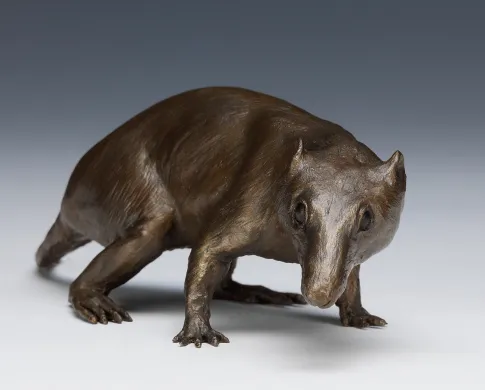 a statue of an extinct mammal in bronze
