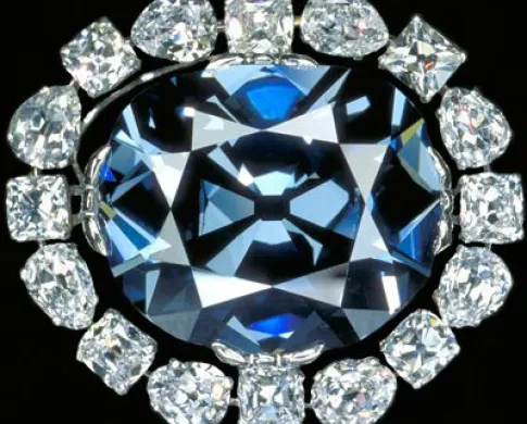blue diamond surrounded by smaller diamonds 