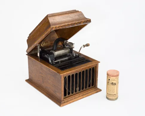 a wooden boxed sound machine with brand Edison