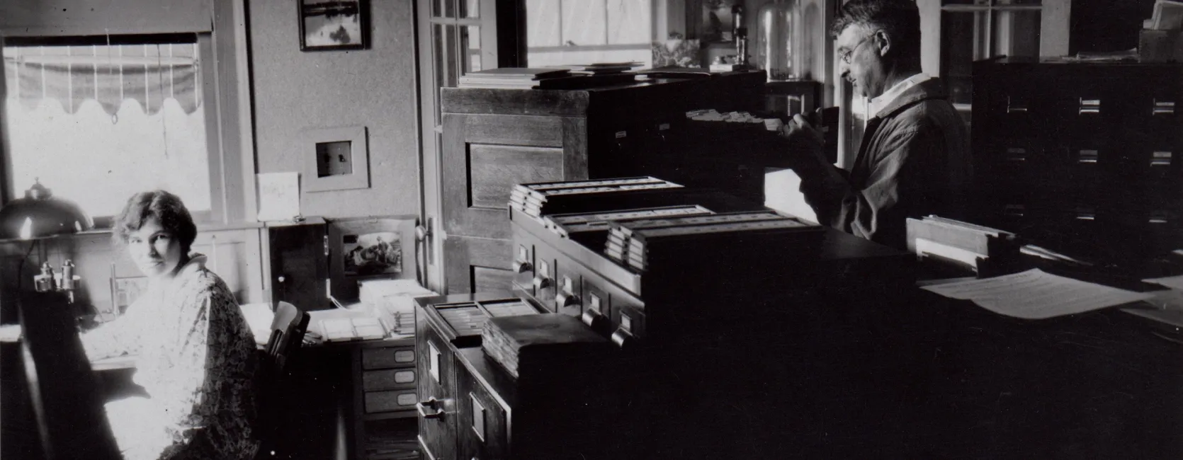 Image of Cushman working in his lab with Moore in Sharon Massachusetts