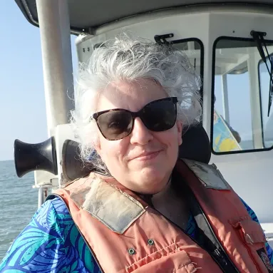 Karen Reed on a boat
