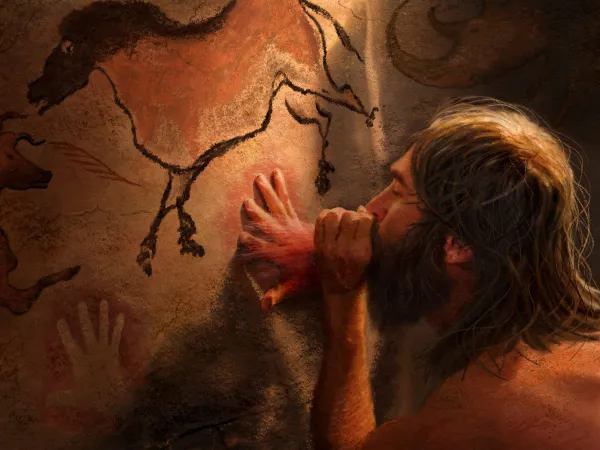 Color illustration of an ancient human making art on a cave wall