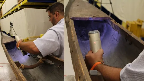 Scanning the interior of a canoe with a 3D scanner.