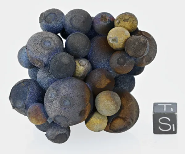 Cluster of chalcopyrite spheres resembling blueberries