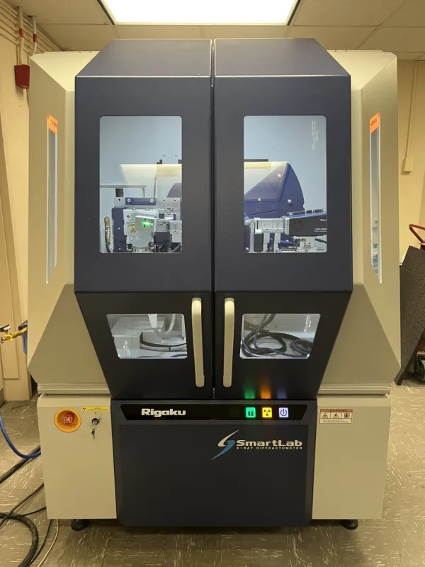 A black cabinet with beige base containing an x-ray diffractometer