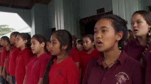 School children singing.