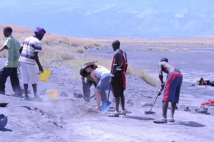 Briana and team uncovering footprints at Engare Sero