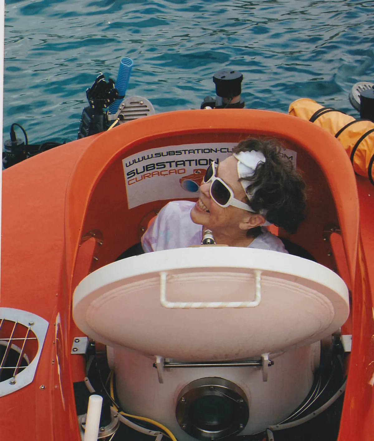 A woman inside of a submarine