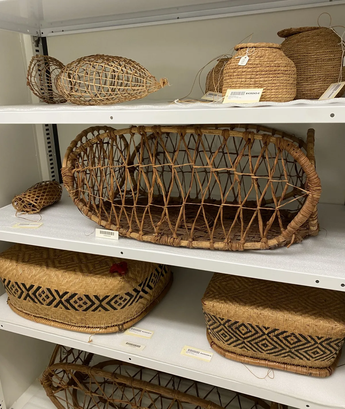 Various woven baskets on display in collections housing.