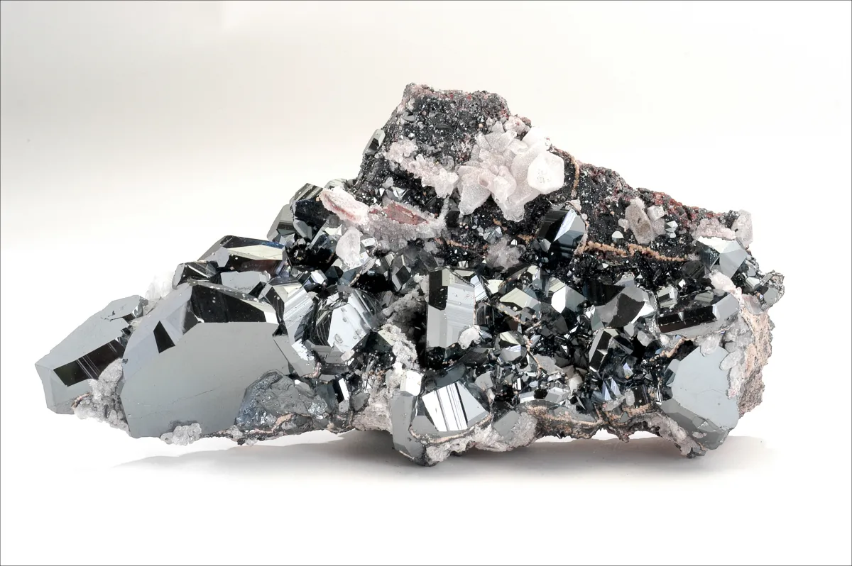 Piece of rock with different components: Gray-black minerals and some white-pink minerals