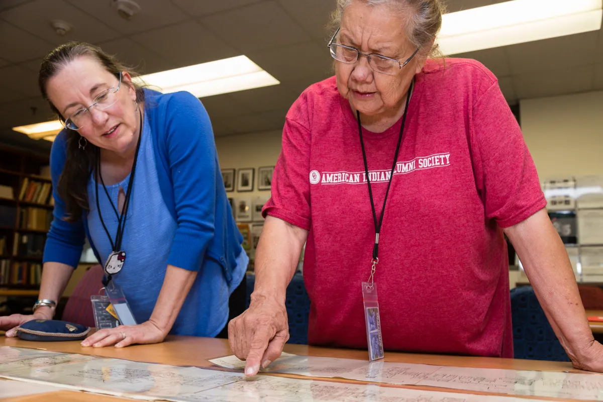 Breath of Life research partners examine historical documents