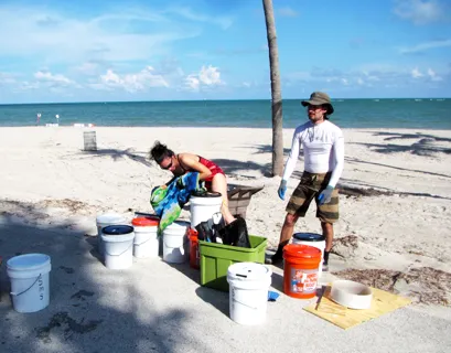 Dr. Chin and tech prepping samples for transport