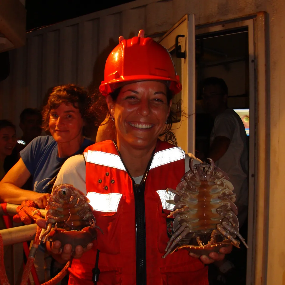 Tara McIver holding isopods