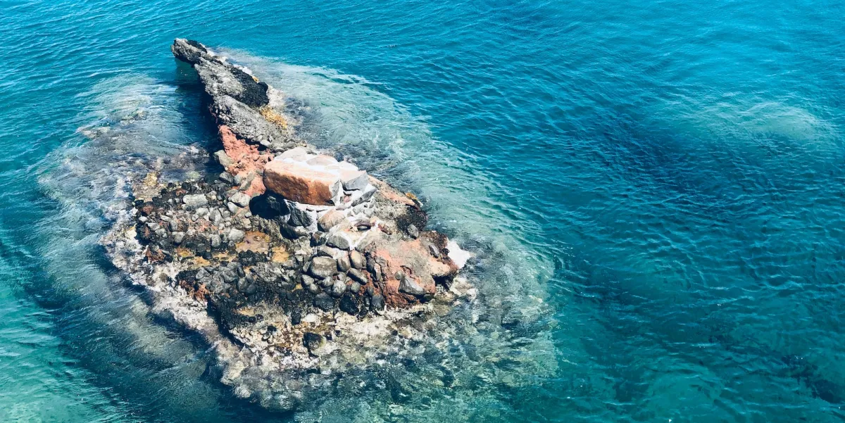 Rocky island in a blue sea